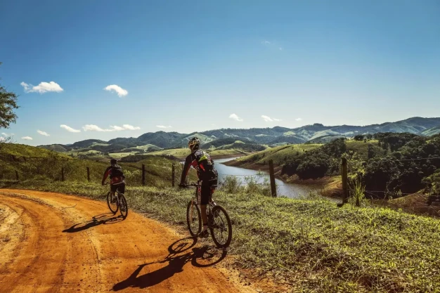 Mountain biking along riverside trails